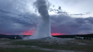 Old Faithful Geyser at Sunset in Yellowstone National Park