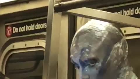 Guy in silver blue alien makeup