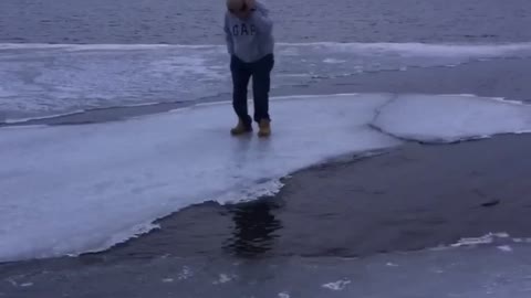 Man Encourages Brother to Jump on Questionable Ice