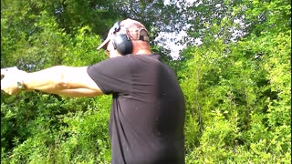 Beretta 951 9MM pistol on the range shooting