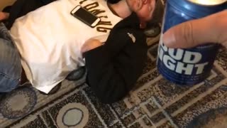 Guy white shirt on floor sleeping drunk