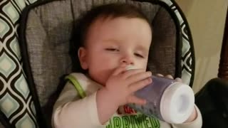 Baby falls asleep drinking his bottle