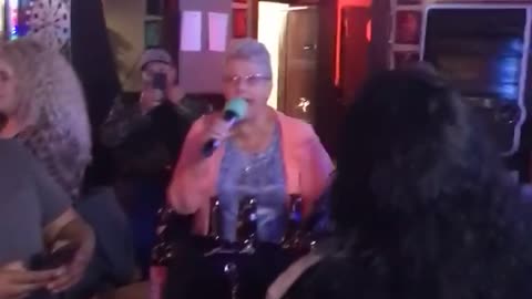 Grandma singing “Let the bodies hit the floor”