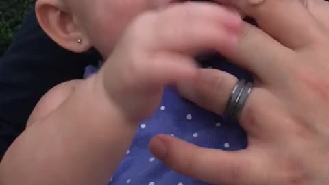 Baby makes funny noises at dad