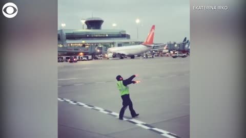 WEB EXTRA: Dancing Airport Employee