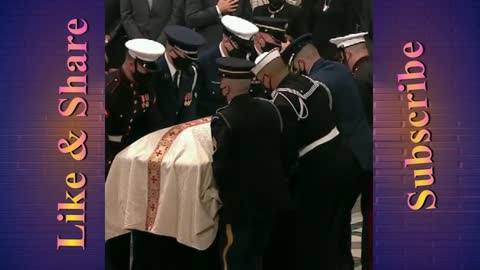 Sen. Bob Dole's casket is carried into the Washington National Cathedral for a memorial service