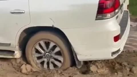 Toyota land cruiser in a mud