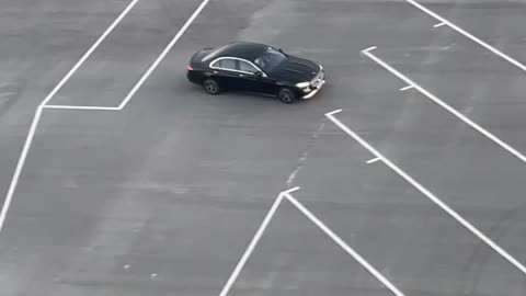 Drifting Mercedes near stadium