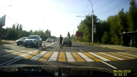 Cyclist Crashes into Car at Crossing