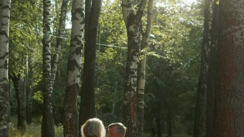 A HAPPY COUPLE IN THE MIDDLE OF A VALLEY