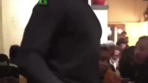 Customer scares cook in front of crowded restaurant