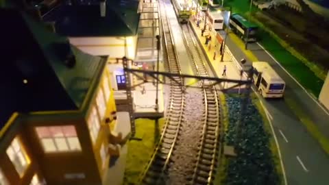 night scene of a model train layout