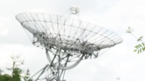 Environment in a meadow with many large antennas