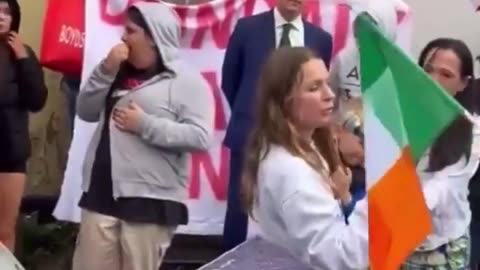 Ukrainian woman interrupts an Irish protest and has to be protected after making death threats