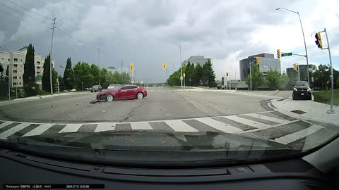 Turning Tesla Collides With SUV