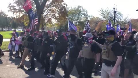 The Proud Boys Form A Circle Around Alex Jones And Act As His Security