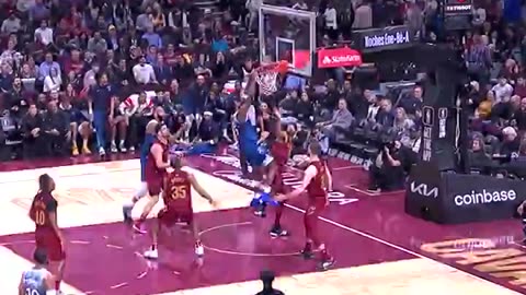 Edwards Soars for Two-Handed Slam Through Cavs!