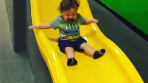 Collab copyright protection - indoor yellow slide baby front flip