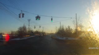 Dashcam captures red light runner