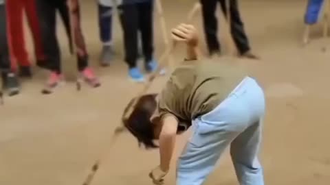 Funny kid with full expert playing with stick