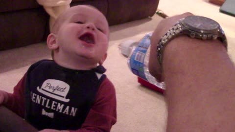Cute toddler hilariously drinks his water
