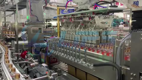 automatic robot carton packer for glass bottles of wine #cartonpacker #casepacker #foryou