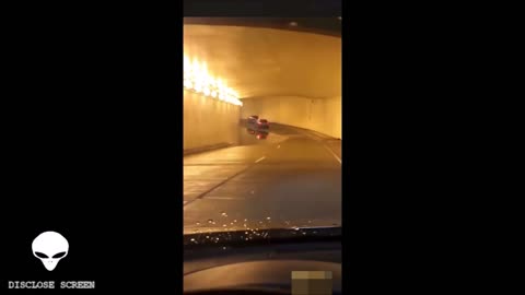 Bizarre optical illusion baffles motorist inside underground tunnel.