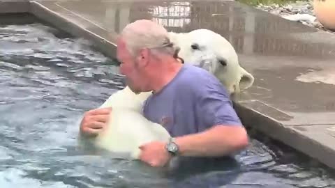 The Only Man In The World Who Can Swim With A Polar Bear: