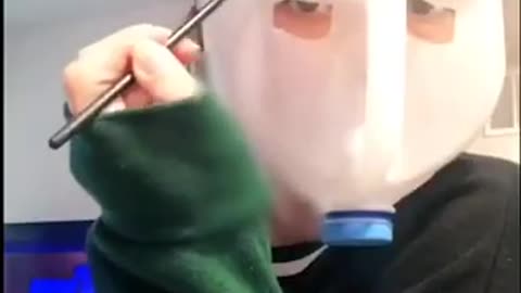 Girl Draws Eyebrows Over Face Shield Made Out of Milk's Plastic Jug