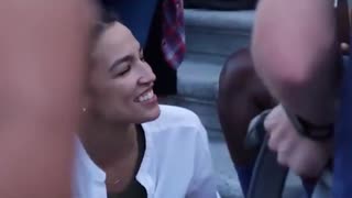 AOC Chats with Large Crowd with No Mask
