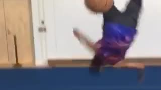 Girl throws basketball at guy backflips falls