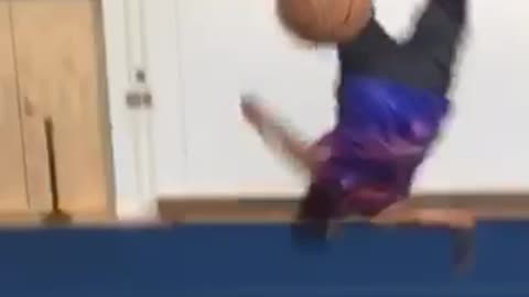 Girl throws basketball at guy backflips falls