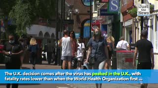 Britain mandates masks in shops after coronavirus peak