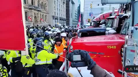 Ottawa police officers gang up and assault a peaceful protester #CANADA