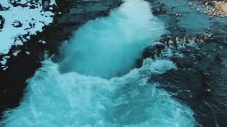 Beautiful Bruarfoss Waterfall Swirls with Glacial Waters
