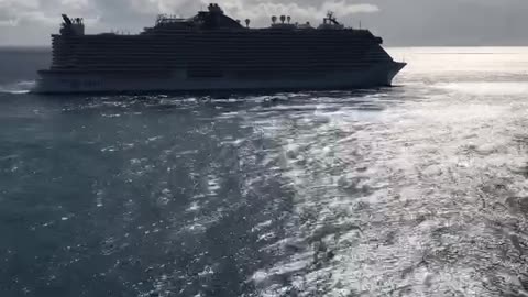 Giant Cruise Ship pulls out of a port TIME LAPSE
