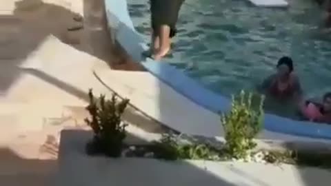 Big Boy Takes The Plunge in a Pool and Makes Big Waves