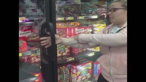 Walmart woman gets hand caught in freezer door