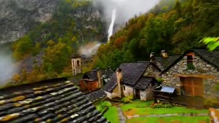 Raining over the Rustici stone houses in the scenic village of Foroglio