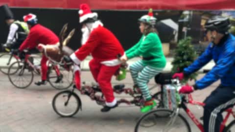 santa claus riding bike