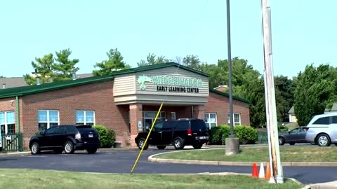 A daycare employee has been charged after shoving a small child to the ground