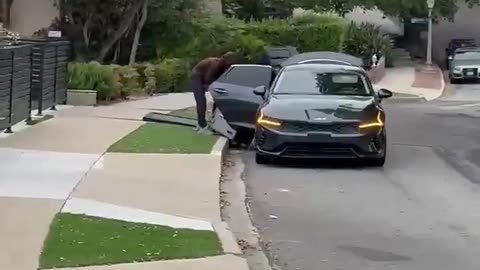 Thieves rolling out a safe in plain sight in Cheviot Hills, California