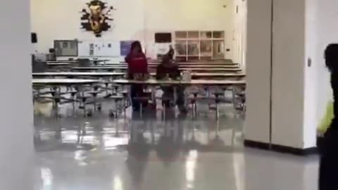 Boy Jumps Girl In School