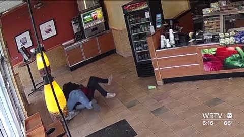 Customer takes down thug.