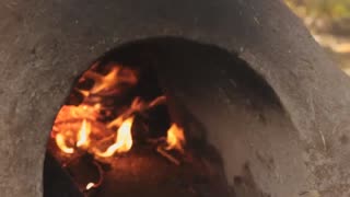 Baking bread in an earthen oven