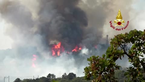 Firefighters battle raging wildfires in northern Italy