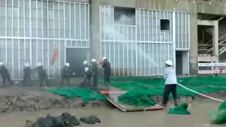 [CHINA] Propaganda Flood Rescue Effort Video Being Shot w/ Fake Rain