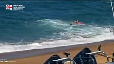 Good Samaritan using an NSRI Pink Rescue Buoy successfully rescues a female from the surf