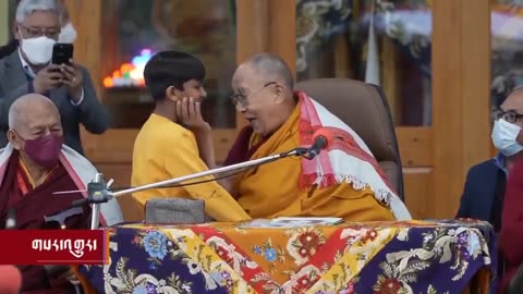 Why is the Dalai Lama fondling this young boy and asking him to “suck his tongue”?