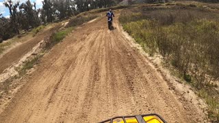 Riding the Can Am 570 Outlander on the MX track.